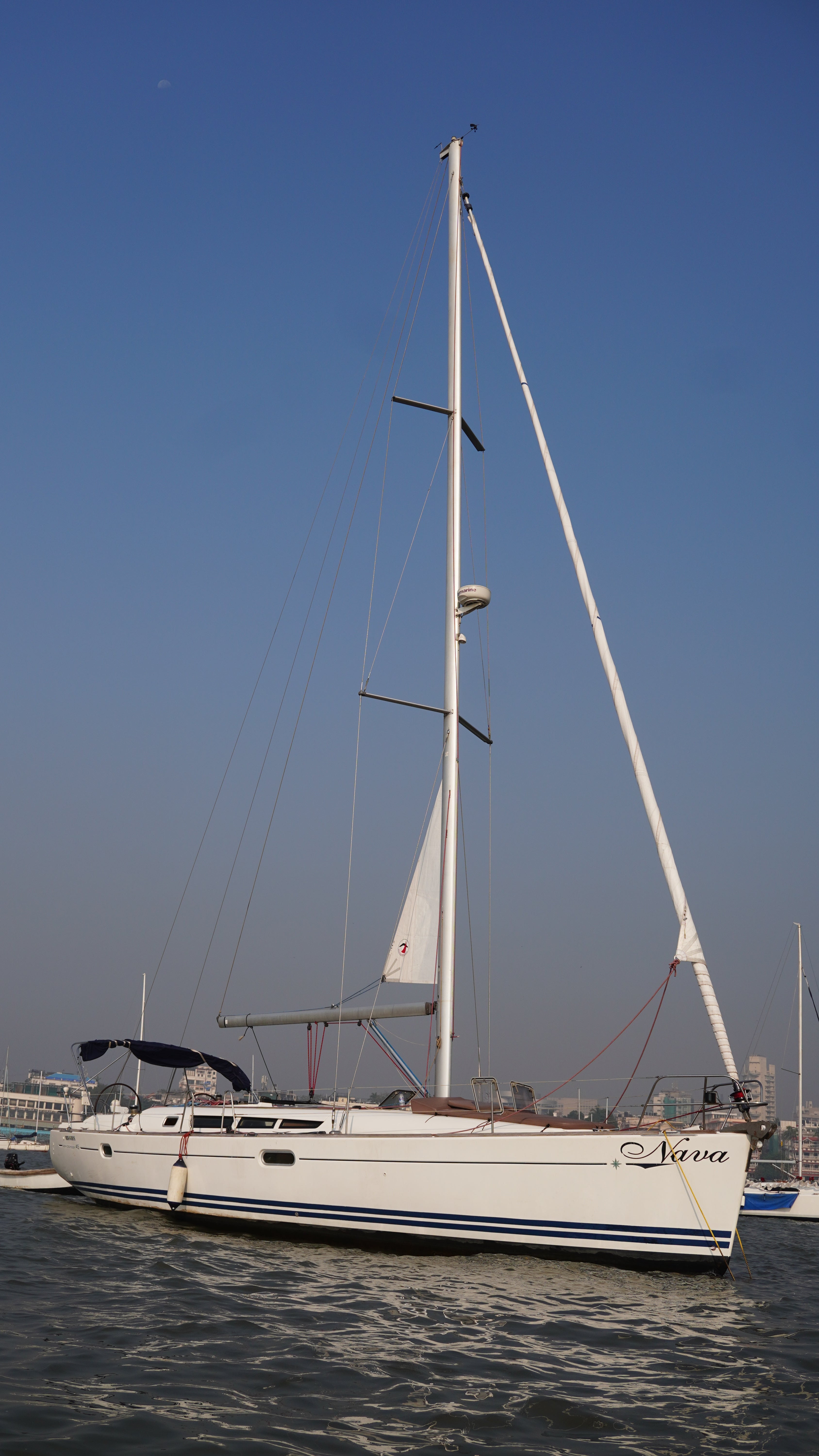 NAva Sailboat on water with clear blue sky